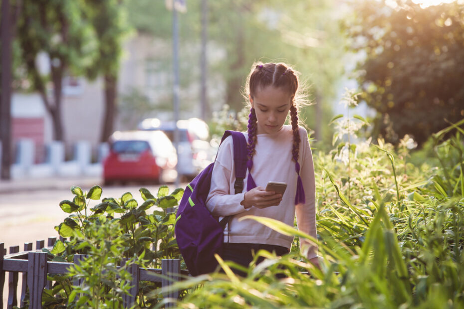 girl walking home from school alone